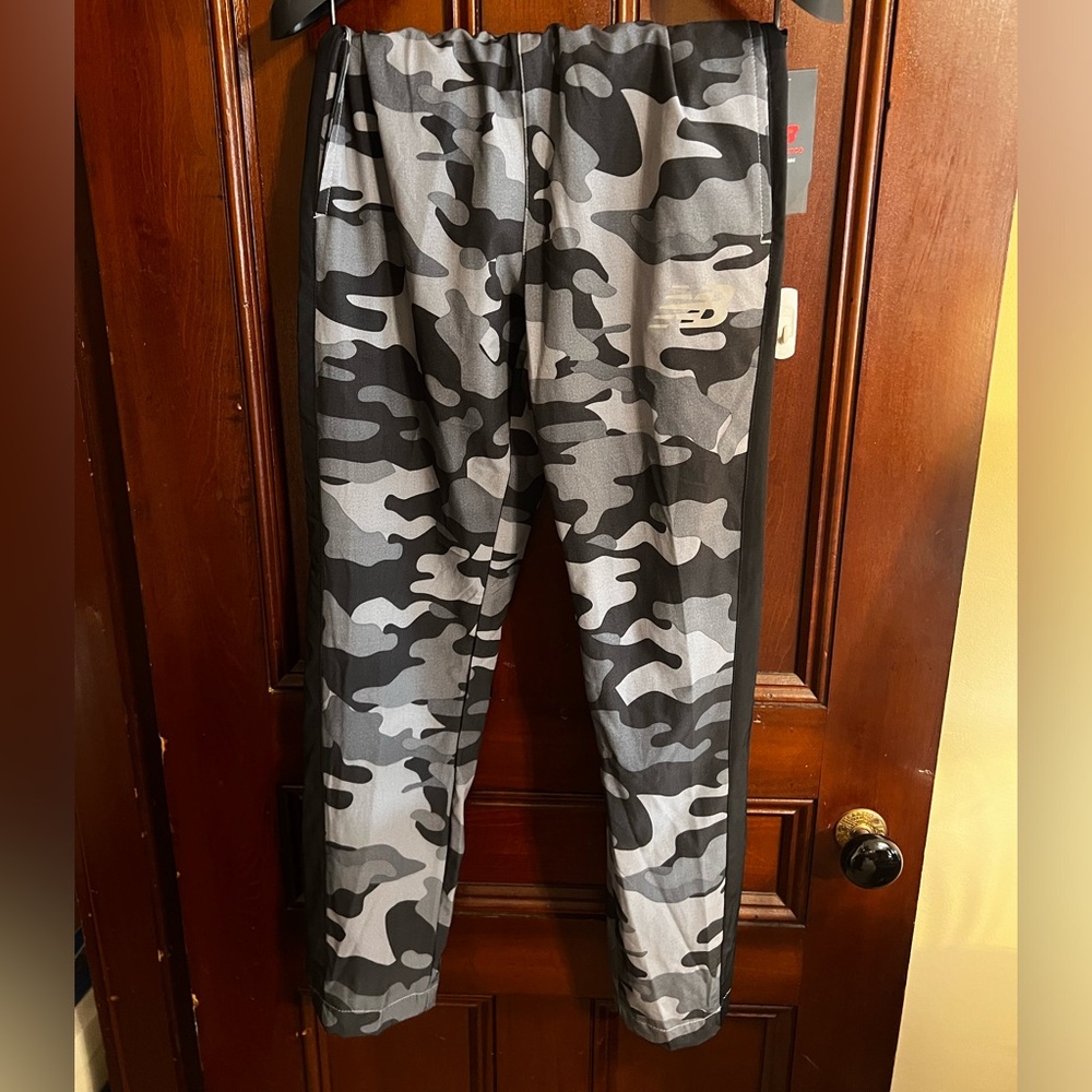 New Balance lightweight athletic pants. Brand new with tags. Size men’s small.